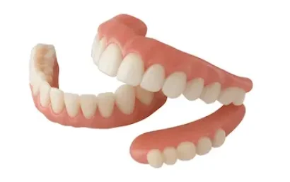 Prótesis híbrida sobre implantes dentales mostrando estructura y precio del tratamiento