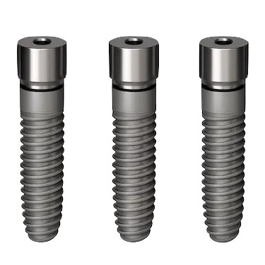 Tres implantes dentales endoóseos de titanio
