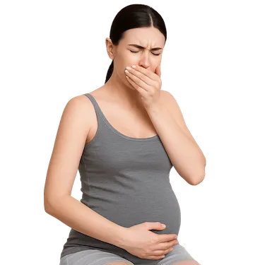 Mujer embarazada con dolor dental que necesita atención urgente en clínica dental en Madrid